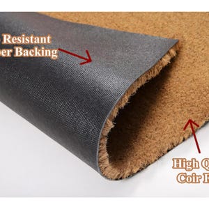 May include: A close-up of a doormat with a brown coir fiber surface and a black slip-resistant rubber backing. Text on the image reads "Slip Resistant Rubber Backing" and "High Quality Coir Fibers."
