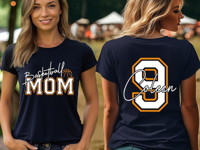 May include: Navy blue t-shirt with the words "Basketball MOM" in white and orange lettering, and a basketball graphic. The back of the shirt displays the number 9 in white with an orange outline and the name "Coleen".