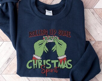 Enrollando una sudadera con espíritu navideño, divertido cuello redondo de Navidad retro, Navidad de moda de inspiración vintage, regalo para un amigo fumeta