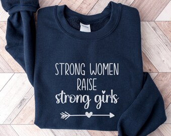 Strong Women Raise Girls Unisex Sweatshirt, Women's Empowerment Tee