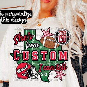 May include: A white t-shirt featuring a green Texas-shaped graphic with white yard lines. The design includes a brown football, a red football helmet with the word Mascot, and red text reading She's from CUSTOM I can tell, plus two stars.