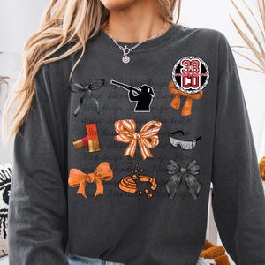 girl shooting skeet coquette png, clay pigeon png, sport shooting png, shooting target png, skeet target png, orange bow png, skeet shooting image 5