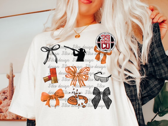 girl shooting skeet coquette png, clay pigeon png, sport shooting png, shooting target png, skeet target png, orange bow png, skeet shooting