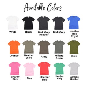 May include: A display of various t-shirt colors, including white, black, dark grey, and royal blue. Other colors are orange, olive, army green, pink, and red. The text "Available Colors" is at the top.