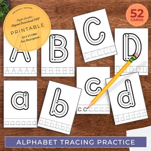 May include: A set of 52 printable alphabet tracing cards for kids. Each card features a letter of the alphabet with dotted lines to help children practice writing. The cards are 12 x 17 cm.
