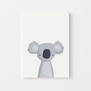 Puede incluir: Una ilustraci&oacute;n simple de un koala gris con ojos negros sobre un fondo blanco.