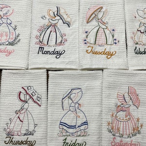 Umbrella girls, hand towels to brighten up your kitchen 7 days of the week.