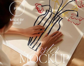 May include: A white poster mockup with a hand-drawn illustration of a bouquet of red and yellow flowers in a blue and yellow striped vase. The text "Poster Mockup" is written in white on the poster.