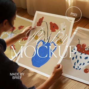 May include: A mockup of a poster featuring a blue vase with red and yellow flowers. The poster is on a light brown background. The text "Poster Mockup" is written in white on the poster. The text "Made by Brief" is written in white at the bottom of the poster.