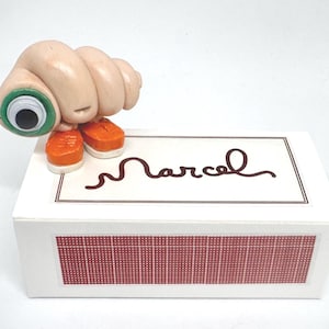 Marcel The Shell With Shoes On, Clay Figurine With Match Box Bed, animated mockumentary comedy-drama film directed by Dean Fleischer