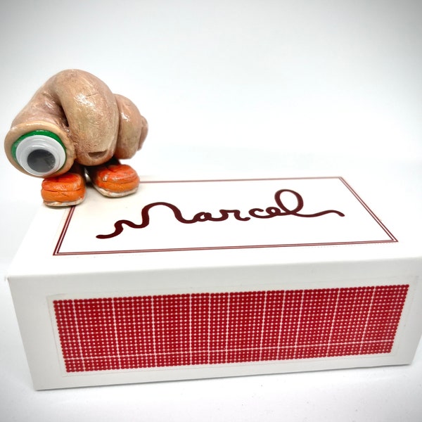 Marcel The Shell With Shoes On, Clay Figurine With Match Box Bed, animated mockumentary comedy-drama film directed by Dean Fleischer