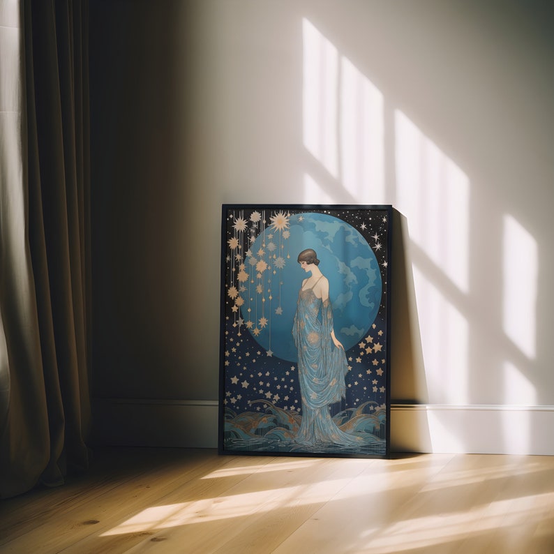 May include: A framed print of a woman standing in front of a blue globe with stars and a crescent moon. The woman is wearing a long, flowing gown and has her hair pulled back. The print is in a black frame.