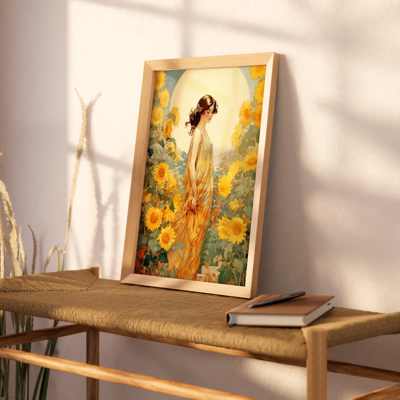 May include: A framed print of a woman in a yellow dress standing in a field of sunflowers. The woman is looking down at the flowers. The background is a light blue sky with a white sun.
