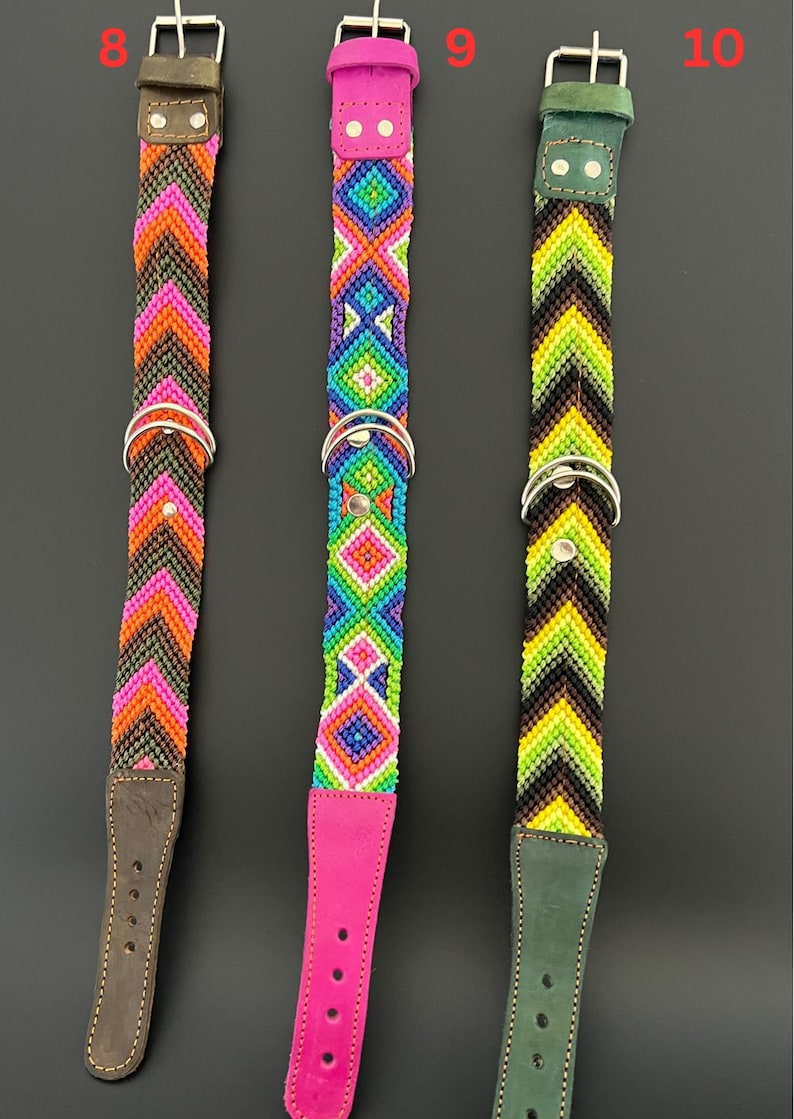 May include: Three colorful dog collars with intricate beaded patterns. The collars feature brown, pink, and green leather accents, silver metal hardware, and vibrant geometric designs in shades of orange, pink, blue, green, and yellow.