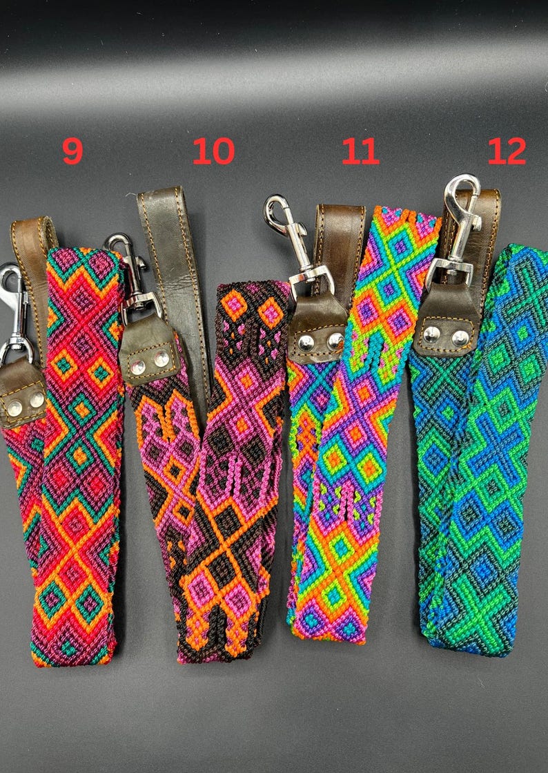 May include: A collection of colorful woven straps with leather accents and metal clasps. The straps feature geometric patterns in various colors, including red, orange, pink, purple, green, and blue. Each strap is labeled with a number from 9 to 12.