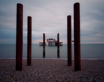 A stunning long exposure fine art photo of the old west pier Brighton, England