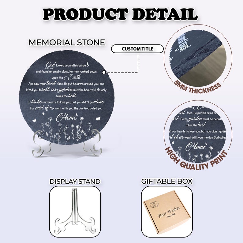 May include: A round, black memorial stone with white text and floral accents, displayed on a clear stand. The text includes the words "Home" and "God's garden must be beautiful." The stone is 5mm thick and comes in a giftable box.