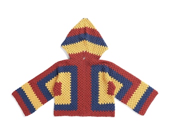 May include: A red, yellow, and blue crocheted hooded jacket with a geometric pattern.