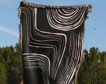 Manta tejida minimalista moderna de líneas negras y beige