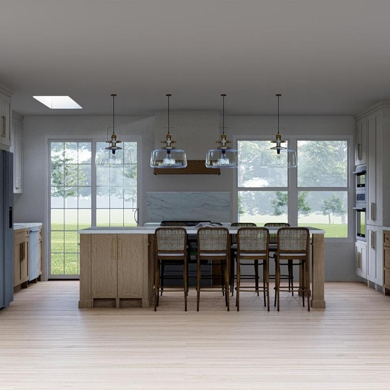 May include: A modern kitchen with a large island and bar seating. The island has a light wood finish with a marble countertop. Clear glass pendant lights hang above the island. The kitchen has large windows overlooking a green outdoor space.