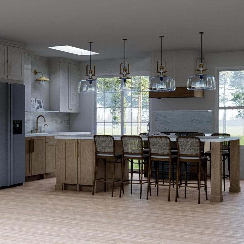 May include: A modern kitchen with light wood cabinetry, a large island with woven bar stools, and pendant lights. The kitchen features a stainless steel refrigerator, a marble countertop, and a large window overlooking a green outdoor space.