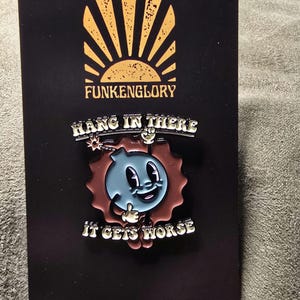 E/namel pins - Hang in there