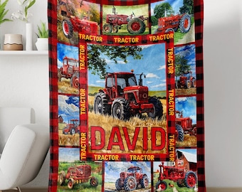 May include: Red and black fleece blanket with a checkered pattern. The blanket features multiple images of red tractors with the name "DAVID" in the center.