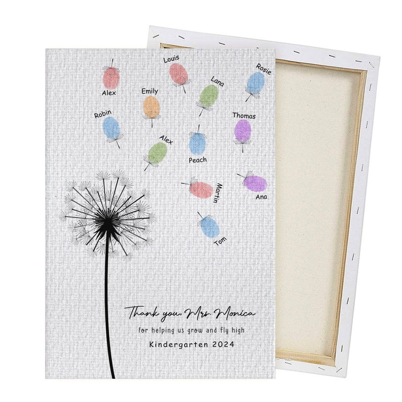 May include: A white canvas print with a black and white dandelion illustration. The dandelion seeds are flying away with names written on each seed. The text "Thank you. Mrs. Monica for helping us grow and fly high Kindergarten 2024" is at the bottom of the print.