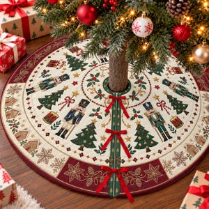 May include: A round cream-colored Christmas tree skirt featuring a festive pattern of nutcrackers, green pine trees, drums, and gingerbread houses. The border is deep red with gold embroidered pinecones, and the slit closes with red ribbons.