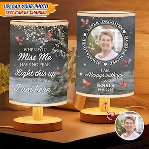 May include: Two personalized memorial lamps with wooden bases. One lamp features the text "When You Miss Me, Have No Fear, Light this up, And Know I am here." The other lamp has a photo, the text "Never Forgotten, Always Loved, Forever Missed, I am Always with you, Senala 1945-2025."