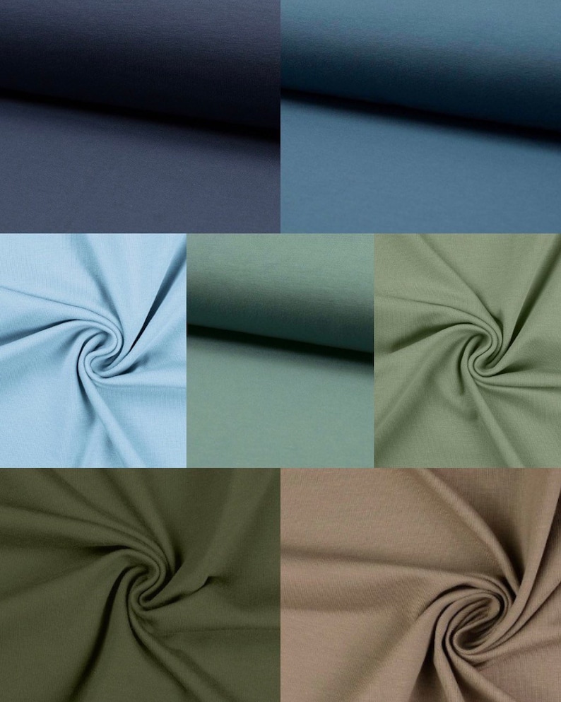 May include: A collection of fabric swatches in various shades of blue, green, and brown. The fabric is a soft, textured knit.