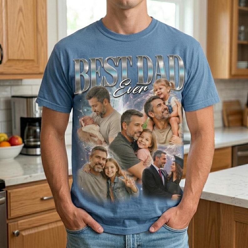 May include: A light blue t-shirt with the text "BEST DAD Ever" in silver lettering. The shirt features a collage of images of a father with his children. The images are in a variety of poses and settings.
