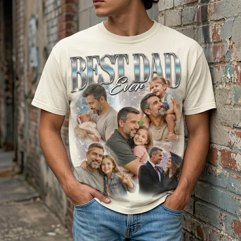 May include: Cream-colored t-shirt with the text "BEST DAD Ever" in a silver and blue design. The shirt features a collage of photos of a father with his children. The person in the image is wearing blue jeans.