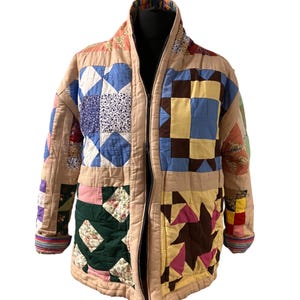 Cosy quilted Jacket, hand made using vintage hand sewn quilt, free size