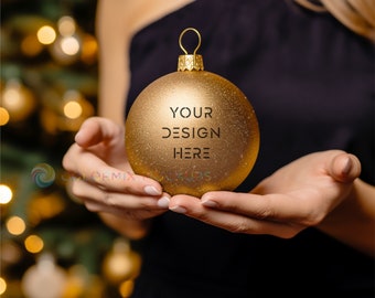Golden Christmas Bauble Mockup in woman hands, Christmas custom Ornament Mockup, golden round Bauble Christmas ornament digital Mockup