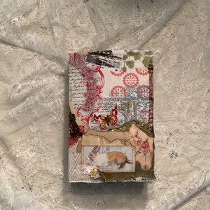 Journal, Beautiful handmade journal loaded with pockets, tucks of various styles. Tags, flips, belly bands, clusters and trims.