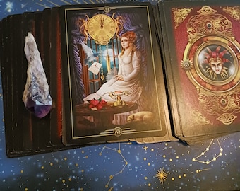 May include: A tarot card reading with two cards laid out on a dark blue background with gold stars. The card on the left is the 'The World' card, and the card on the right is the 'The Fool' card.