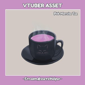 May include: A black teacup with a cat design on the side, filled with pink matcha tea and steam rising from the top. The teacup is on a black saucer.