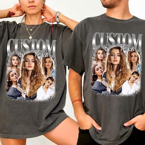 May include: Dark gray t-shirts with a custom design. The design features a central portrait surrounded by other images of the same person, with the text "CUSTOM Text" in a silver metallic font.