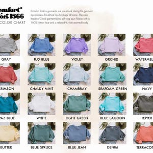 The image is a color chart displaying various color options for comfortable color garments. It features a grid of 12 different color options, each with a corresponding image showing the garment in that color. The color options include gray, blue, green, purple, orange, navy, chambray, sea foam green, navy, chambray, white, light green, blue lagoon, pepper, butter, blue spruce, blue jean, denim, and terracotta.