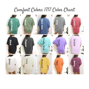 May include: A color chart for Comfort Colors 1717 t-shirts. The chart displays various colors, including Light Green, Moss, Blue Jean, Gray, Cumin, Black, Pepper, Chalky Mint, Violet, Orchid, White, Ivory, Mustard, Yam, and Berry.