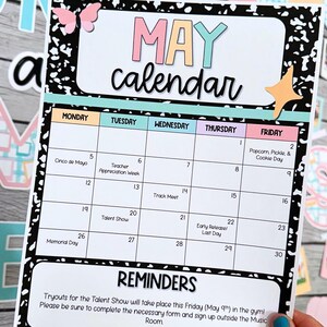 May include: A printable May calendar with a black and white notebook paper design. The calendar has a colorful title with the word "MAY" in large letters. The calendar includes dates and events such as Cinco de Mayo, Teacher Appreciation Week, Track Meet, Talent Show, Early Release Last Day, Memorial Day, and Popcorn, Pickle & Cookie Day. The calendar also includes a reminder for talent show tryouts.