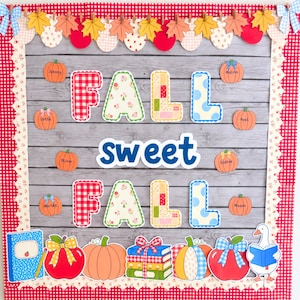 May include: A bulletin board display featuring a gray wood-grain background with a red gingham border. The text reads FALL sweet FALL in patterned letters. Decorative elements include paper pumpkins with names, autumn leaves, and a reading goose.