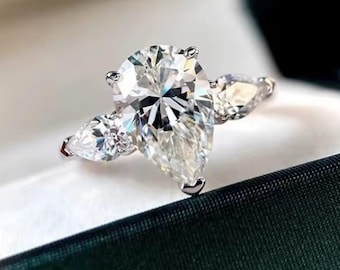 Anita- 1 Carat Moissanite 925 Sterling/pear cut Silver engagement/wedding ring