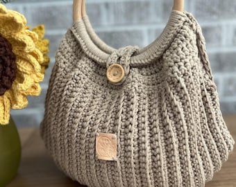 Wzór torebki z uchwytem pierścieniowym