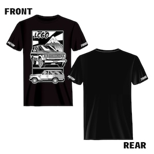 May include: Black t-shirt with a white graphic of a Toyota Land Cruiser LC60, a mountain, and the text "LC60" and "TOUGE NATION". The back of the shirt is plain black with the text "TOUGE NATION" on the left sleeve and "TOUGE" on the right sleeve.
