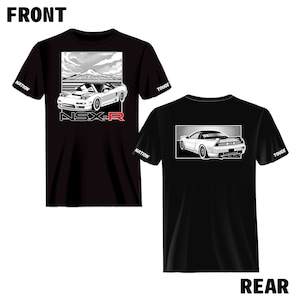 May include: Black t-shirt featuring a white graphic of a Honda NSX-R on the front and a white graphic of the rear of the car on the back. The front graphic includes a mountain scene in the background. The text "NSX-R" is printed in red on the front of the shirt. The text "TOUGE" is printed on the right sleeve and "NATION" is printed on the left sleeve.