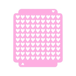Può includere: Stencil rosa con una griglia di forme di cuore bianche.