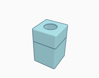 May include: A light blue square tissue box with a round opening on the top.