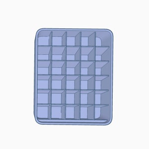 May include: A blue plastic ice cube tray with 24 individual compartments.